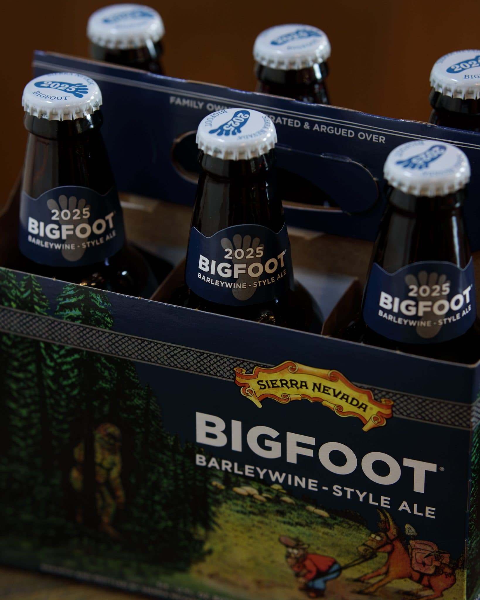 A closeup shot of Bigfoot bottle caps inside a 6-pack