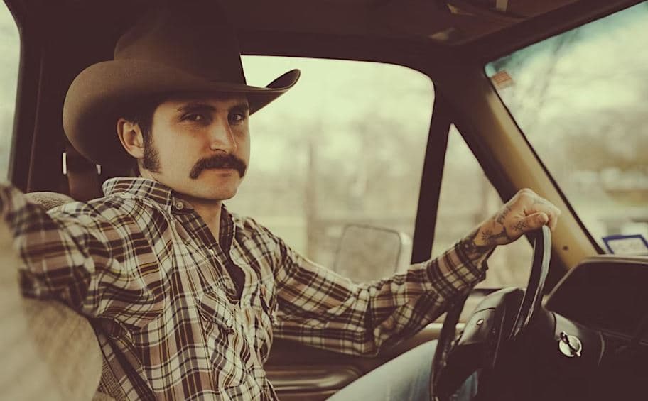 Jessee Daniel driving a truck
